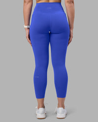 Woman wearing Fusion Ultra High-Rise 7/8 Legging Pockets - Power Cobalt | Model:Amy | Size:M