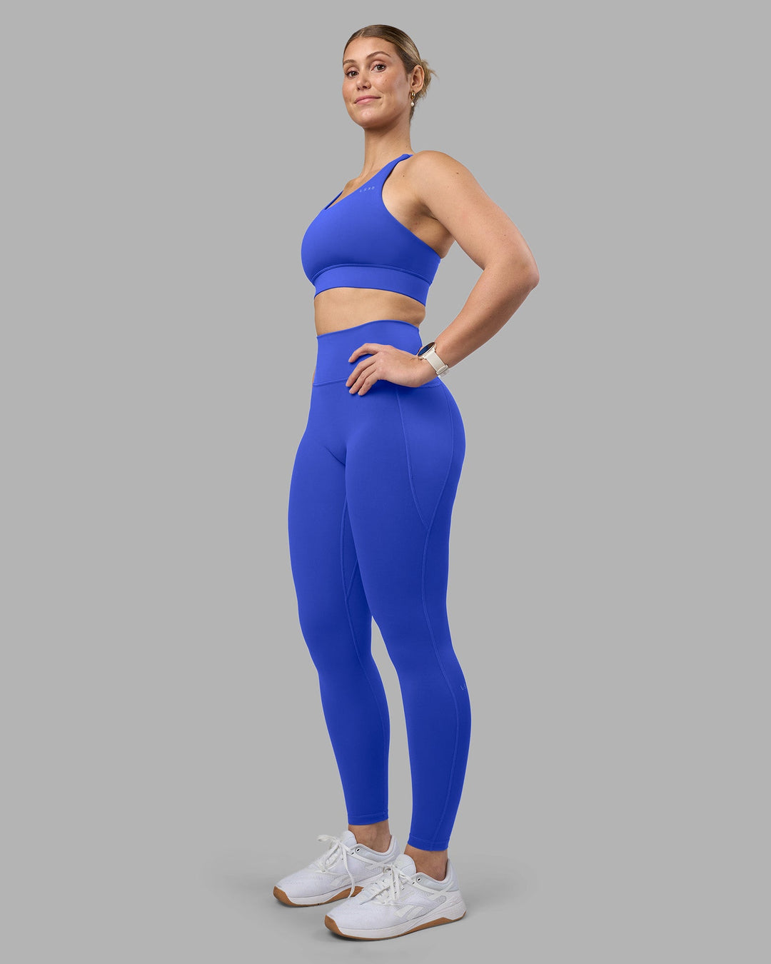 Woman wearing Fusion Ultra High-Rise Full Length Legging Pockets - Power Cobalt | Model:Amy | Size:M