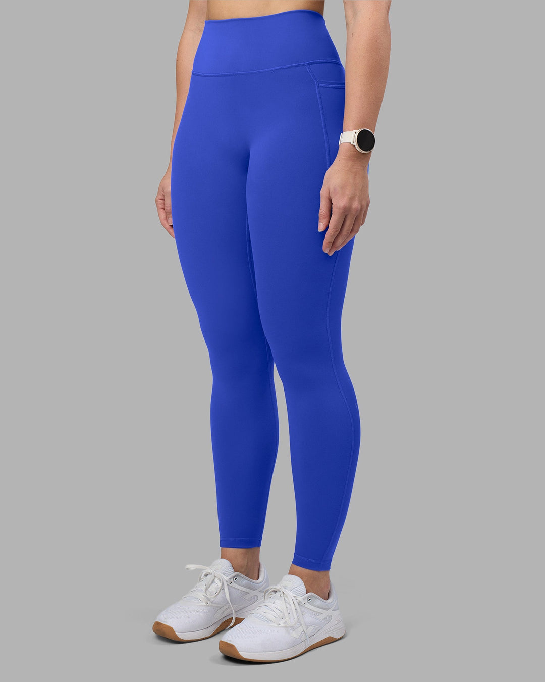 Woman wearing Fusion Ultra High-Rise Full Length Legging Pockets - Power Cobalt | Model:Amy | Size:M