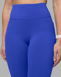 Woman wearing Fusion Ultra High-Rise Full Length Legging Pockets - Power Cobalt | Model:Amy | Size:M