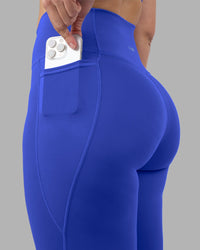 Woman wearing Fusion Ultra High-Rise Full Length Legging Pockets - Power Cobalt | Model:Amy | Size:M