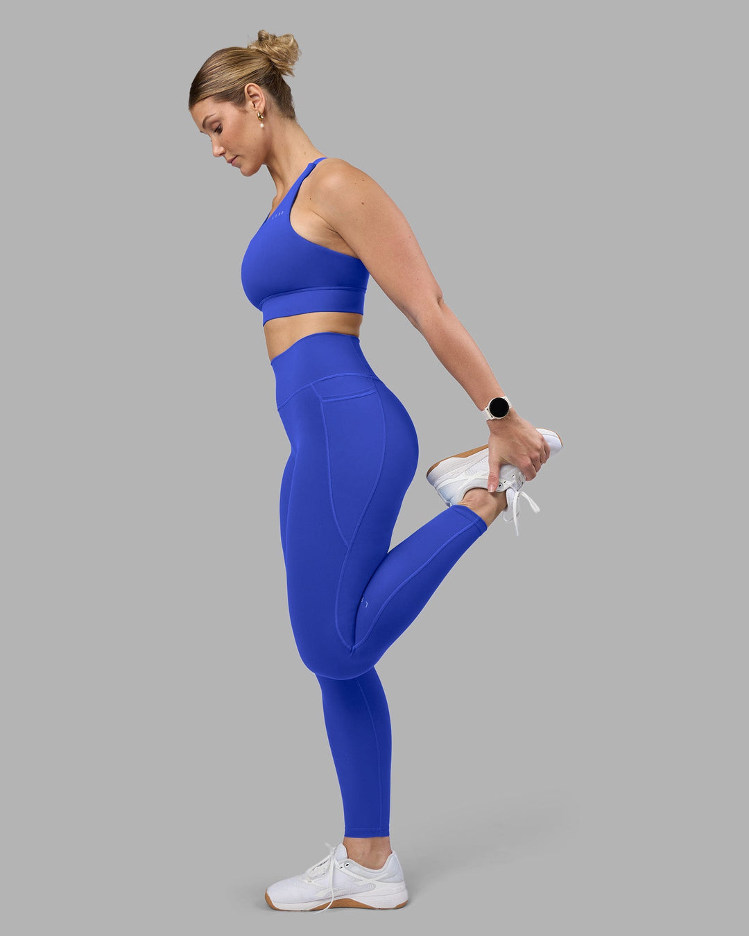Woman wearing Fusion Ultra High-Rise Full Length Legging Pockets - Power Cobalt | Model:Amy | Size:M