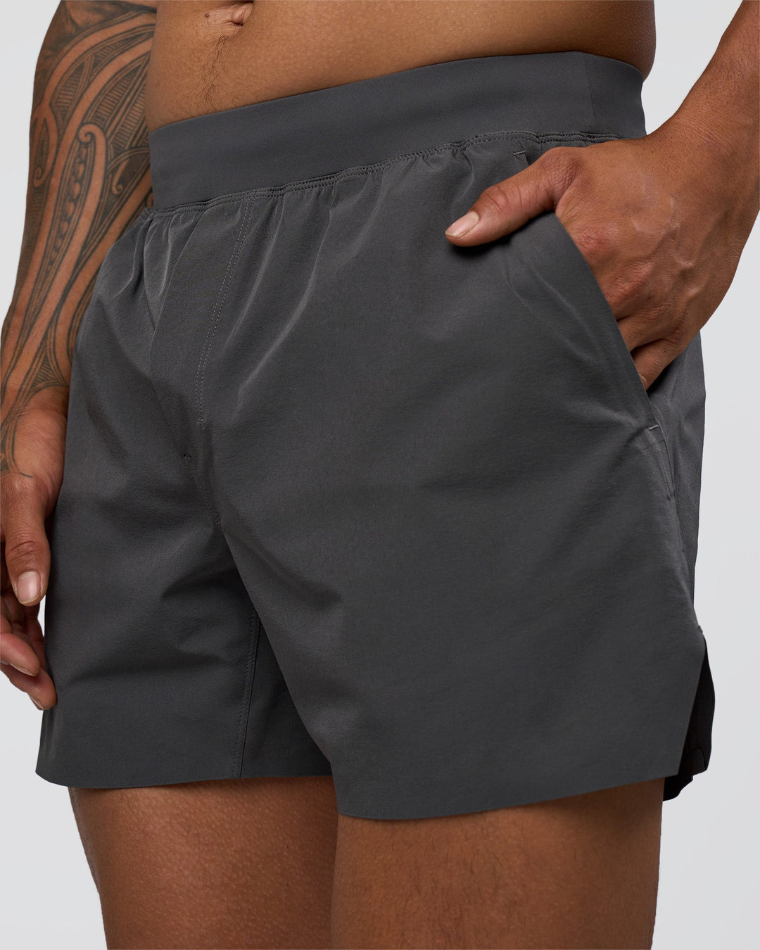 Man wearing Hybrid 5" Short - Dark Storm | Model:Daarian | Size:M - view 3