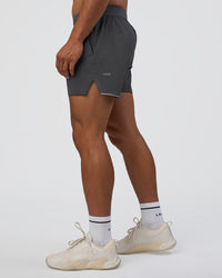 Man wearing Hybrid 5" Short - Dark Storm | Model:Daarian | Size:M | Thumbnail Index: 5
