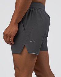 Man wearing Hybrid 5" Short - Dark Storm | Model:Daarian | Size:M | Thumbnail Index: 0