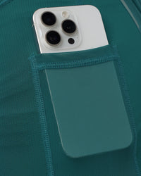Man wearing Hybrid Lined 5" Short - Transformative Teal | Model:Konnor | Size:M