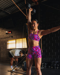 Woman wearing Inspired Sports Bra - Pink Luminous | Model:Teraipine | Size:M