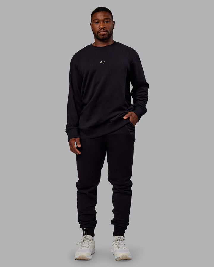 Man wearing Leg It Sweater - Black-Volt
