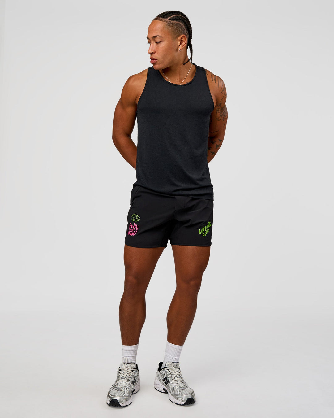Man wearing Lift 6" Short - Black-Sugar Plum Lime | Model:Malebo | Size:M