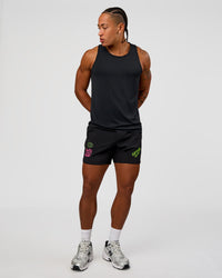 Man wearing Lift 6" Short - Black-Sugar Plum Lime | Model:Malebo | Size:M