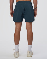 Man wearing Lift 6" Short - Night Sea | Model:Konnor | Size:M