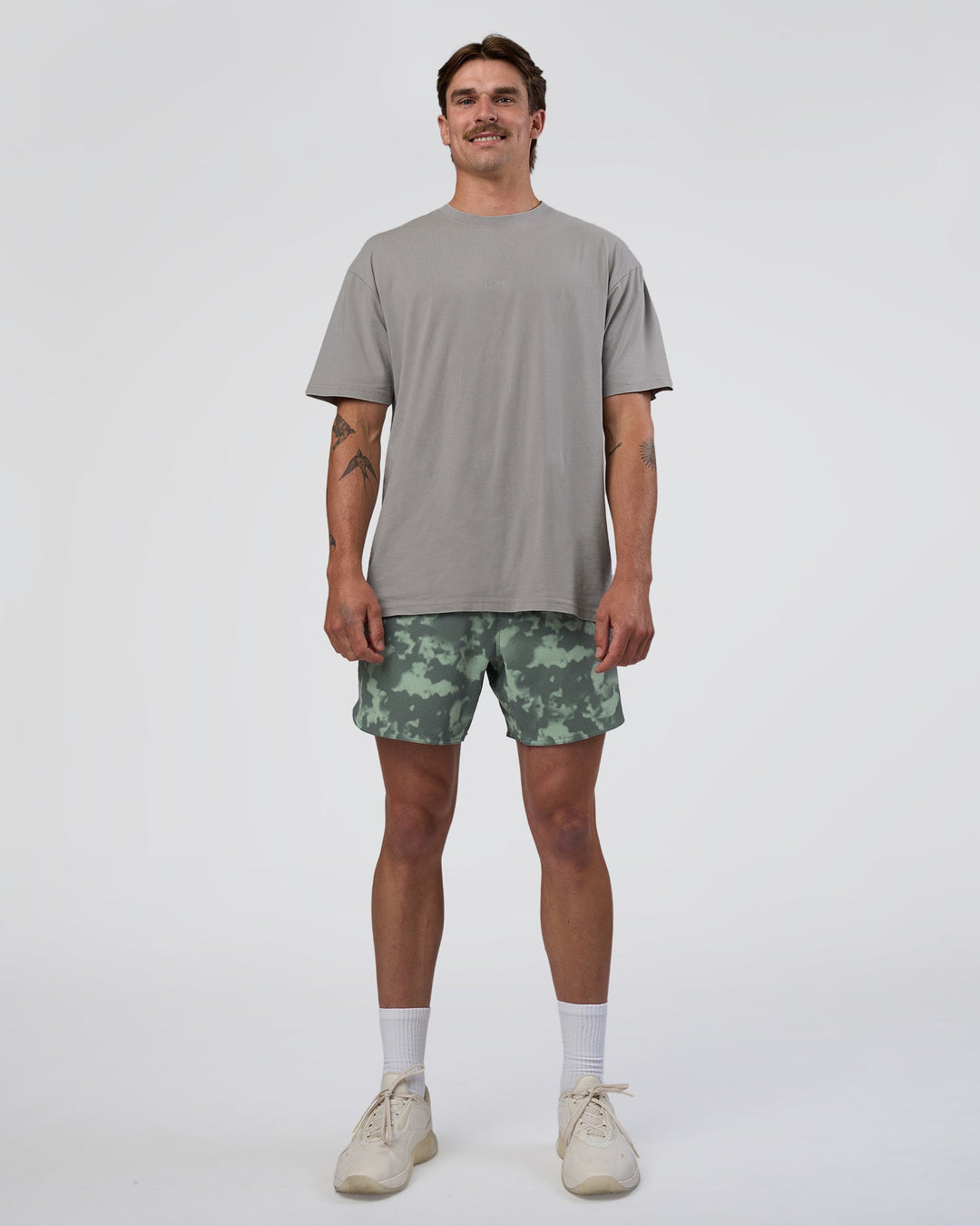 Man wearing Lift 6" Short - Washed Camo Carbon | Model:Konnor | Size:M