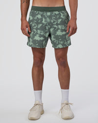 Man wearing Lift 6" Short - Washed Camo Carbon | Model:Konnor | Size:M