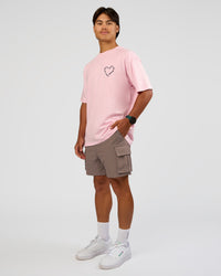 Man wearing Love The Process FLXCotton Oversize Tee - Marshmallow-Midnight Plum | Model:George | Size:M