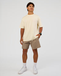 Man wearing Love The Process FLXCotton Oversize Tee - Off White-Marshmallow | Model:George | Size:M