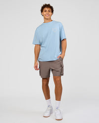 Man wearing Love The Process FLXCotton Oversize Tee - Open Air-Off White | Model:Leandro | Size:M | Thumbnail Index: 9