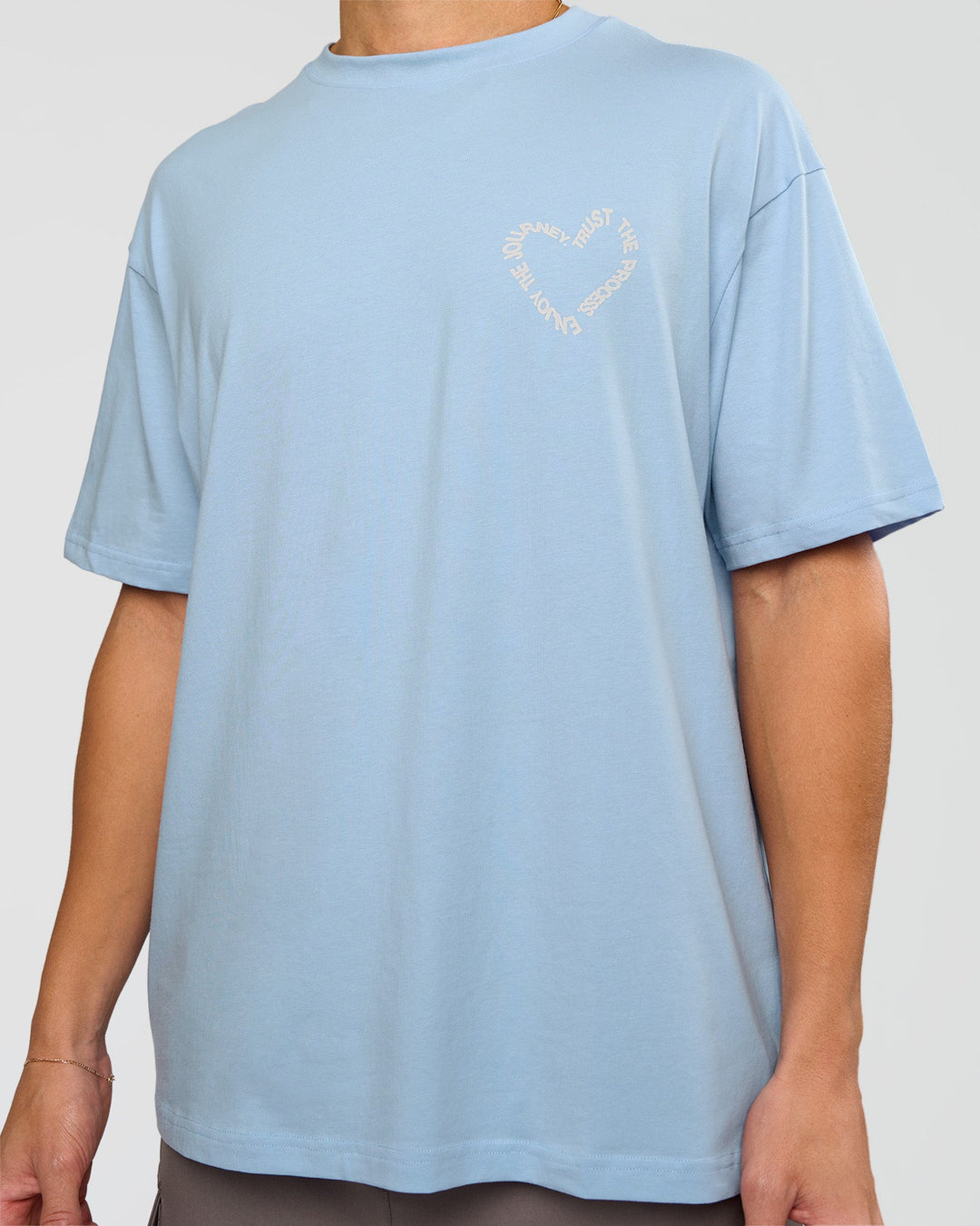 Man wearing Love The Process FLXCotton Oversize Tee - Open Air-Off White | Model:Leandro | Size:M - view 7