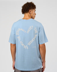 Man wearing Love The Process FLXCotton Oversize Tee - Open Air-Off White | Model:Leandro | Size:M | Thumbnail Index: 1