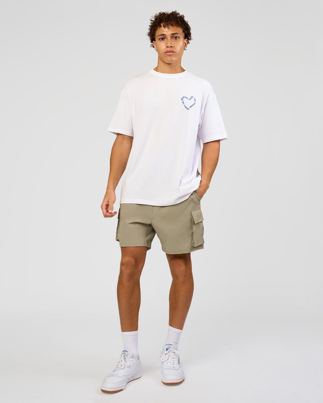 Man wearing Love The Process FLXCotton Oversize Tee - White-Electric Indigo | Model:Leandro | Size:M - view 9