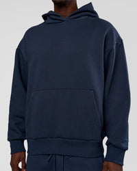 Man wearing MVP Oversized Hoodie - Future Navy | Model:Okello | Size:M