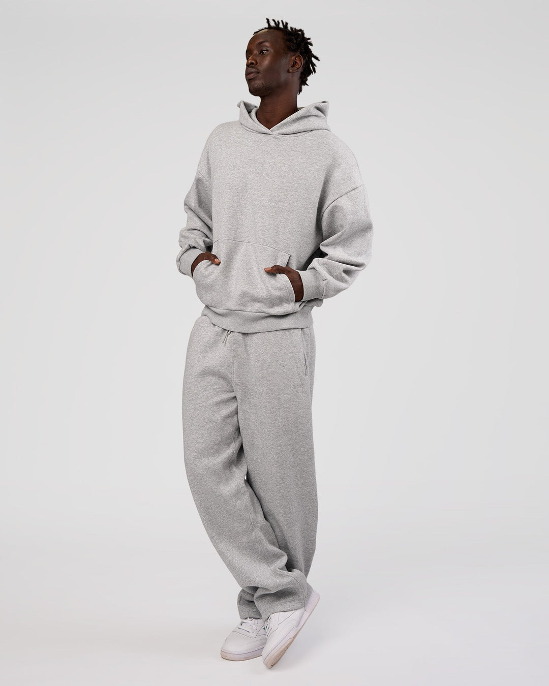 Man wearing MVP Oversized Hoodie - Light Grey Marl | Model:Okello | Size:M