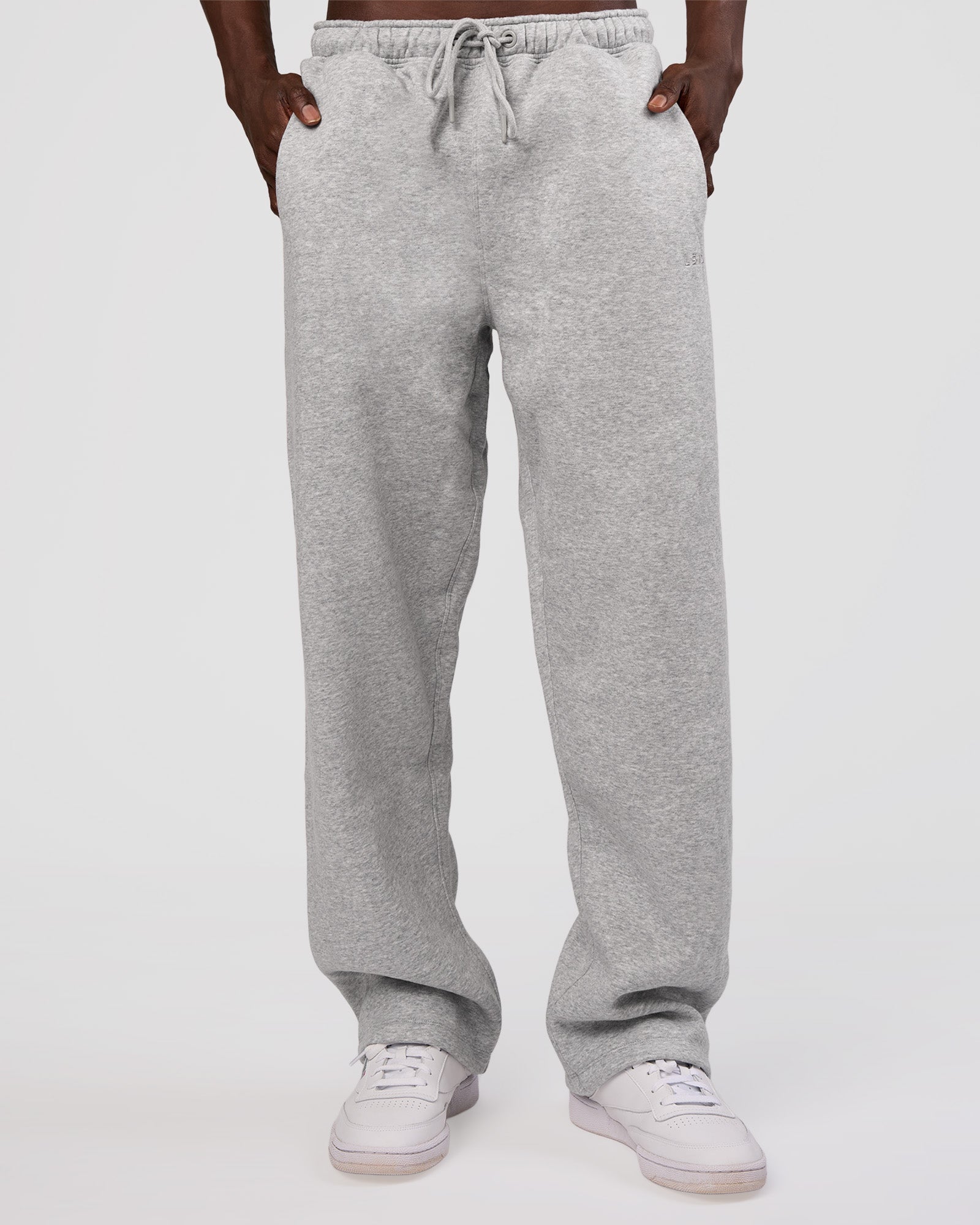 Man wearing MVP Straight Leg Pant - Light Grey Marl | Model:Okello | Size:M