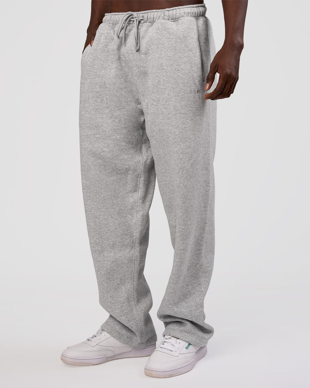 Man wearing MVP Straight Leg Pant - Light Grey Marl | Model:Okello | Size:M
