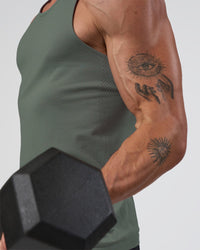 Man wearing AeroFLX+ Seamless Tank - Graphite/Graphite | Model:Konnor | Size:M