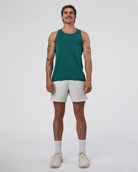 Man wearing AeroFLX+ Seamless Tank - Transformative Teal/Transformative Teal | Model:Konnor | Size:M