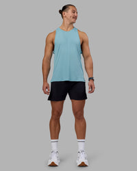 Man wearing Pace Running Tank - Retro Blue | Model:Jaiden | Size:M