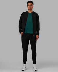 Man wearing Train-Lite FLXMAX Jacket - Black