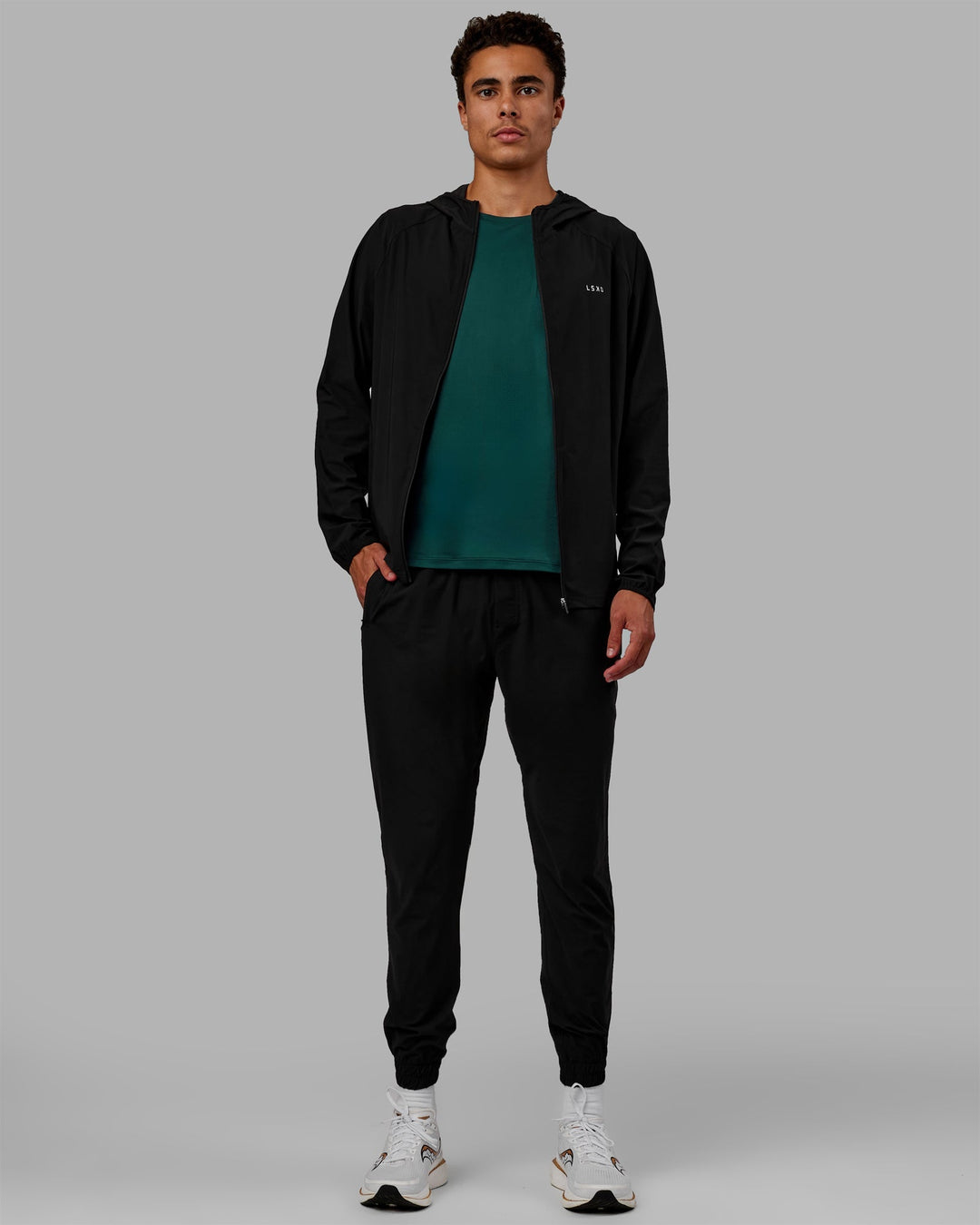 Man wearing Train-Lite FLXMAX Pants - Black