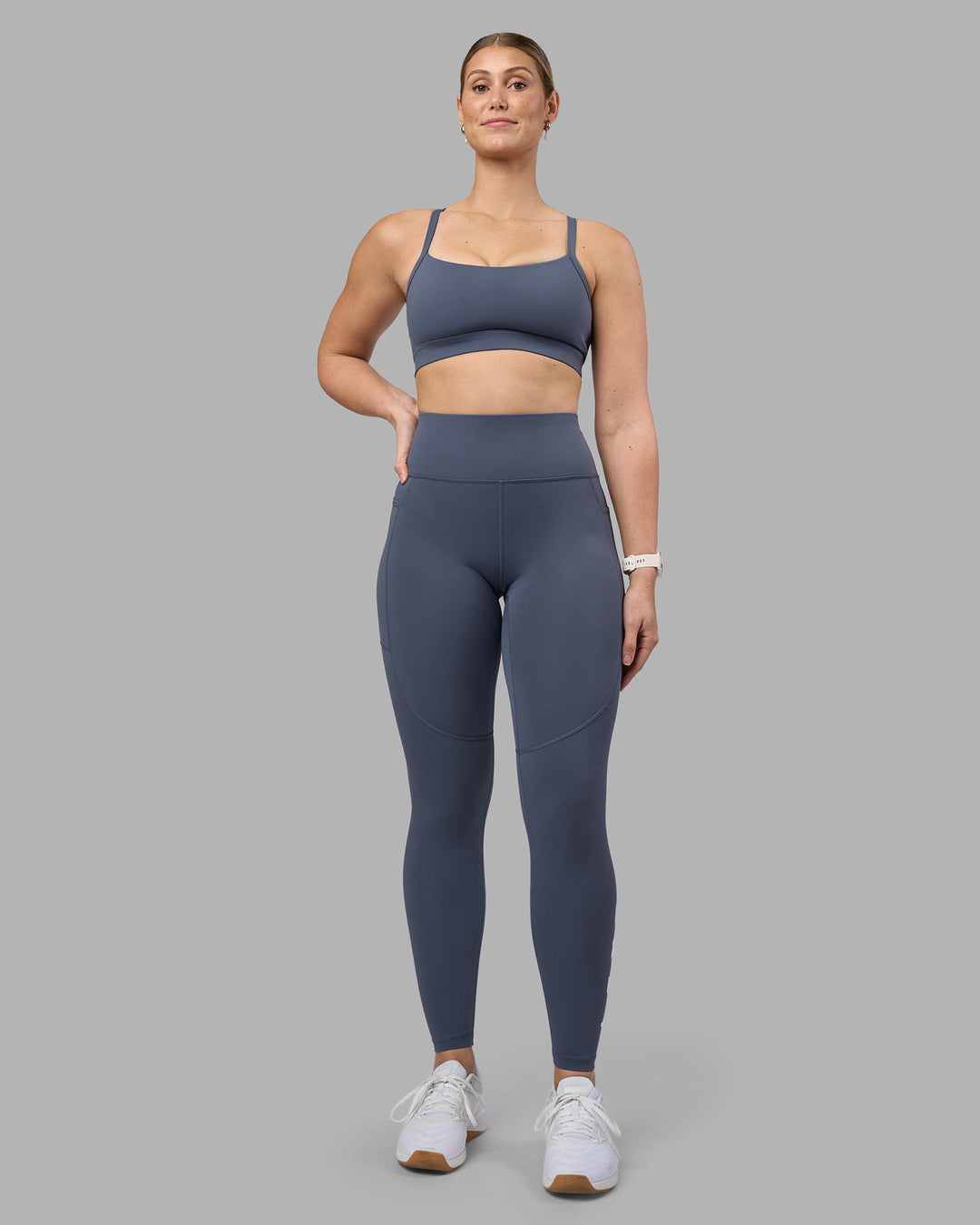 Woman wearing Momentum Sports Bra D/DD/E - Night Shadow | Model:Amy | Size:M