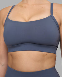 Woman wearing Momentum Sports Bra D/DD/E - Night Shadow | Model:Amy | Size:M