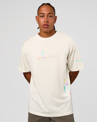 Man wearing Mother's Day FLXCotton Oversize Tee - Off White | Model:Malebo | Size:M