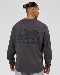 Man wearing Move Fast Heavyweight Oversized Long Sleeve Tee - Dark Storm Washed | Model:Jaiden | Size:M