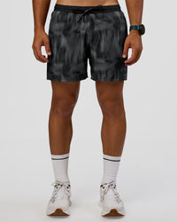 Man wearing Pace 5" Lined Running Short - Lunar Glow | Model:George | Size:M