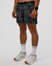 Man wearing Pace 5" Lined Running Short - Lunar Glow | Model:George | Size:M