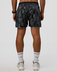 Man wearing Pace 5" Lined Running Short - Lunar Glow | Model:George | Size:M