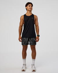 Man wearing Pace 5" Lined Running Short - Lunar Glow | Model:George | Size:M
