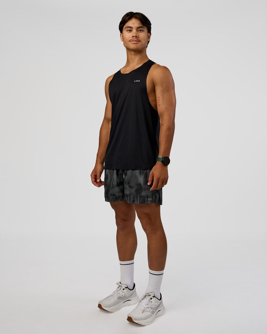 Man wearing Pace 5" Lined Running Short - Lunar Glow | Model:George | Size:M