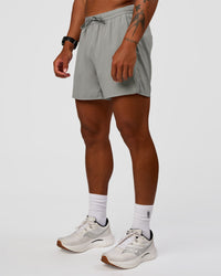 Man wearing Pace 5" Lined Running Short - Alloy | Model:Malebo | Size:M