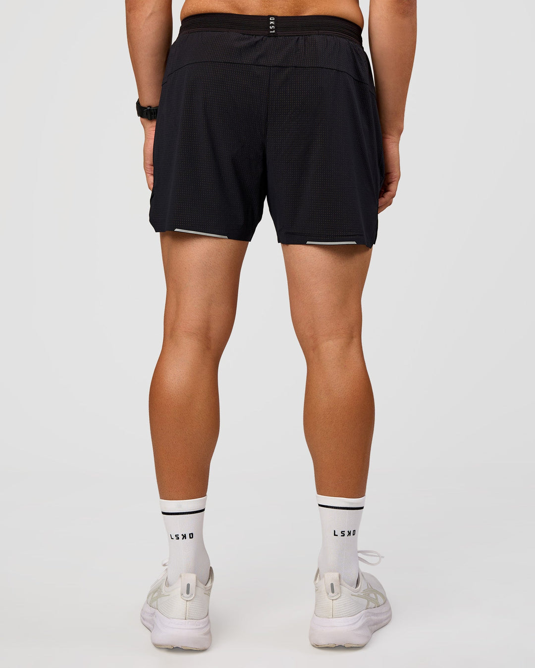 Man wearing Pace 5" Lined Ripstop Short - Black | Model:Liam | Size:M |