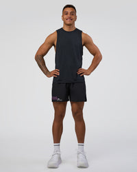 Man wearing Pace 5" Lined Running Short - Black-Ultra Fuchsia | Model:Daarian | Size:M