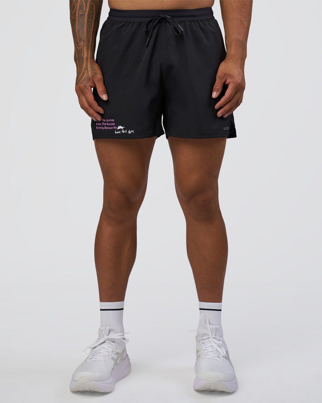 Man wearing Pace 5" Lined Running Short - Black-Ultra Fuchsia | Model:Daarian | Size:M