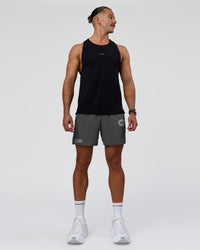 Man wearing Pace 5" Lined Running Short - Dark Storm-Alloy | Model:Jaiden | Size:M