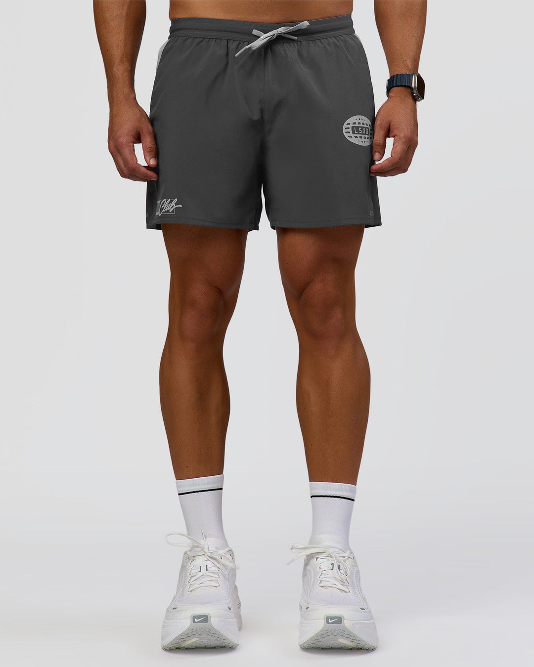 Man wearing Pace 5" Lined Running Short - Dark Storm-Alloy | Model:Jaiden | Size:M