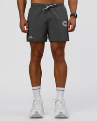 Man wearing Pace 5" Lined Running Short - Dark Storm-Alloy | Model:Jaiden | Size:M