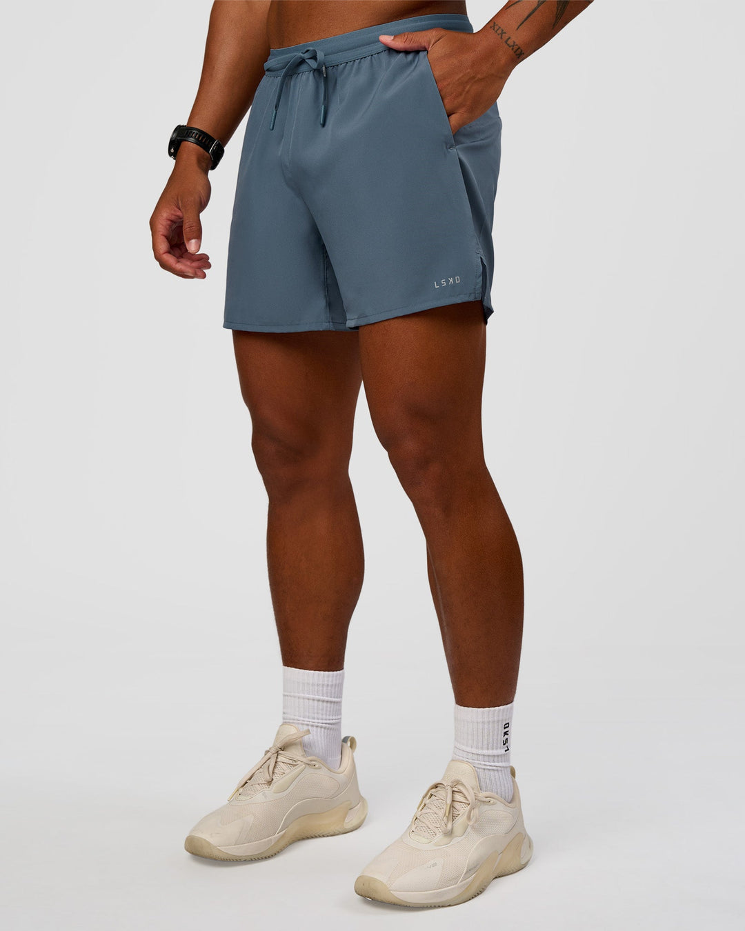 Man wearing Pace 5" Running Short - Blue Mirage | Model:Malebo | Size:M