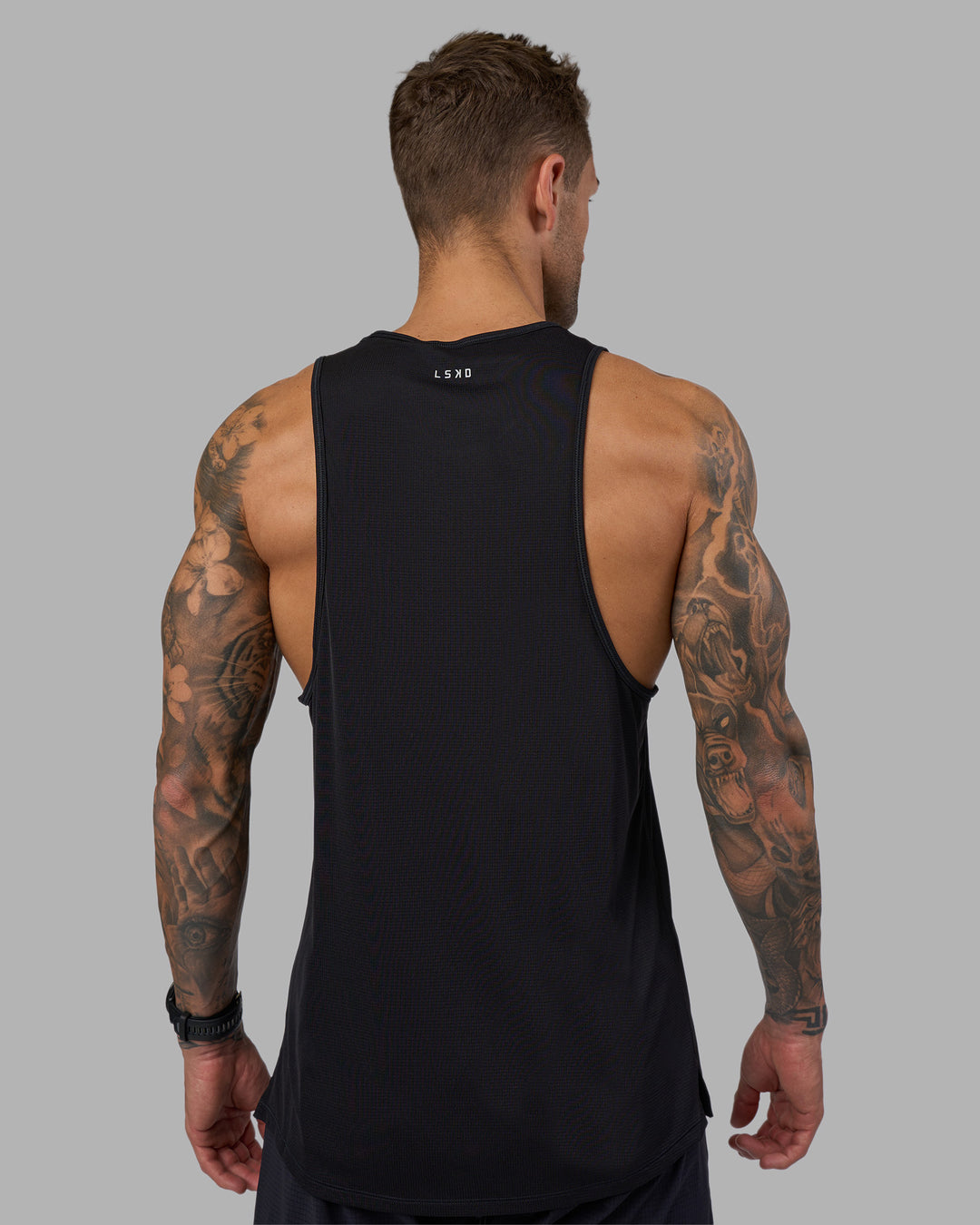 Man wearing Pace Running Tank - Black | Model:Tommy | Size:M